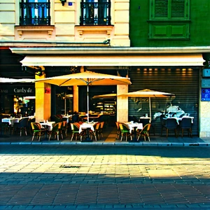 Urban Long Exposure Photography: Urban Street With Cafes And Shops With Restaurant Large