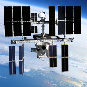 A Space Shuttle With A Large Satellite On Top Of It