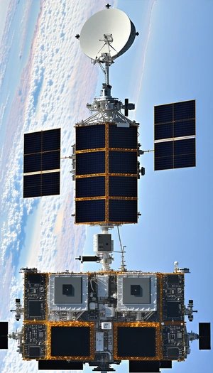 A Large Spacecraft Is Seen From A Distance, With A View Of The Earth Below