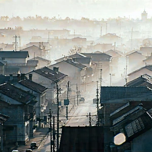 Urban Etching: Cityscape of small town during foggy morning
