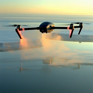 A Black Helicopter Flying Over A Frozen Lake