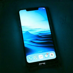 Tech Aerial Photography: Smartphone With Glowing Screen With Smartphone Displayed