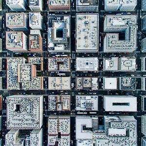 Urban Aerial Photography: Aerial view of (city:1.12) blocks