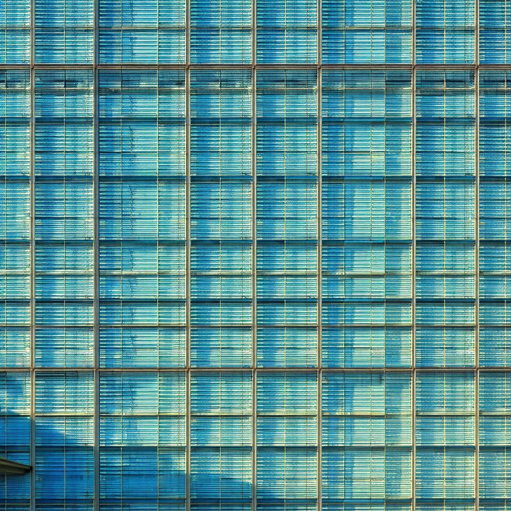 Large blue building with many windows