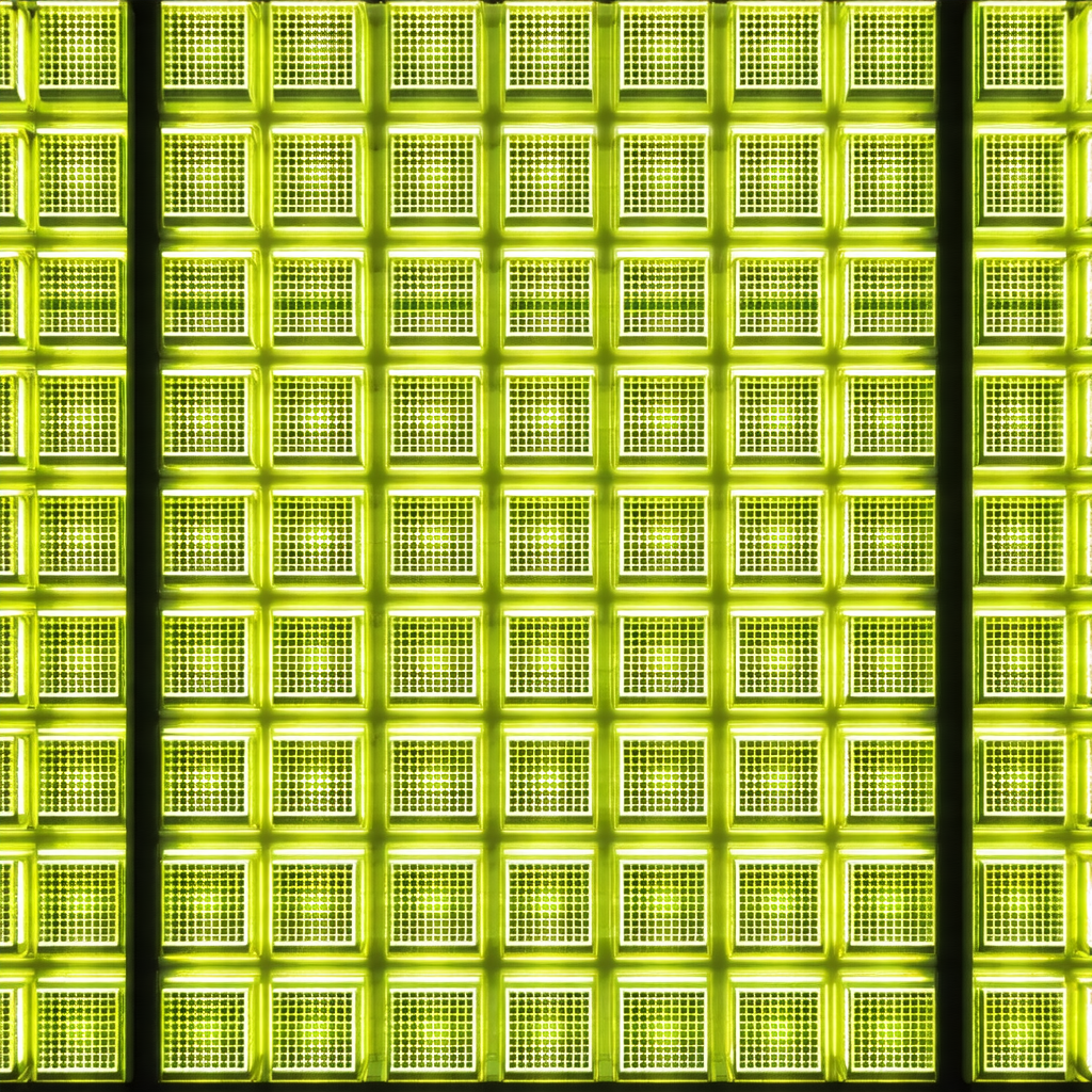 Large, brightly lit green square with a checkered pattern