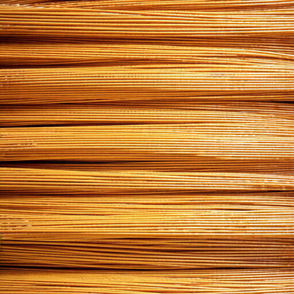Large stack of yellow, wavy, and curly ribbons
