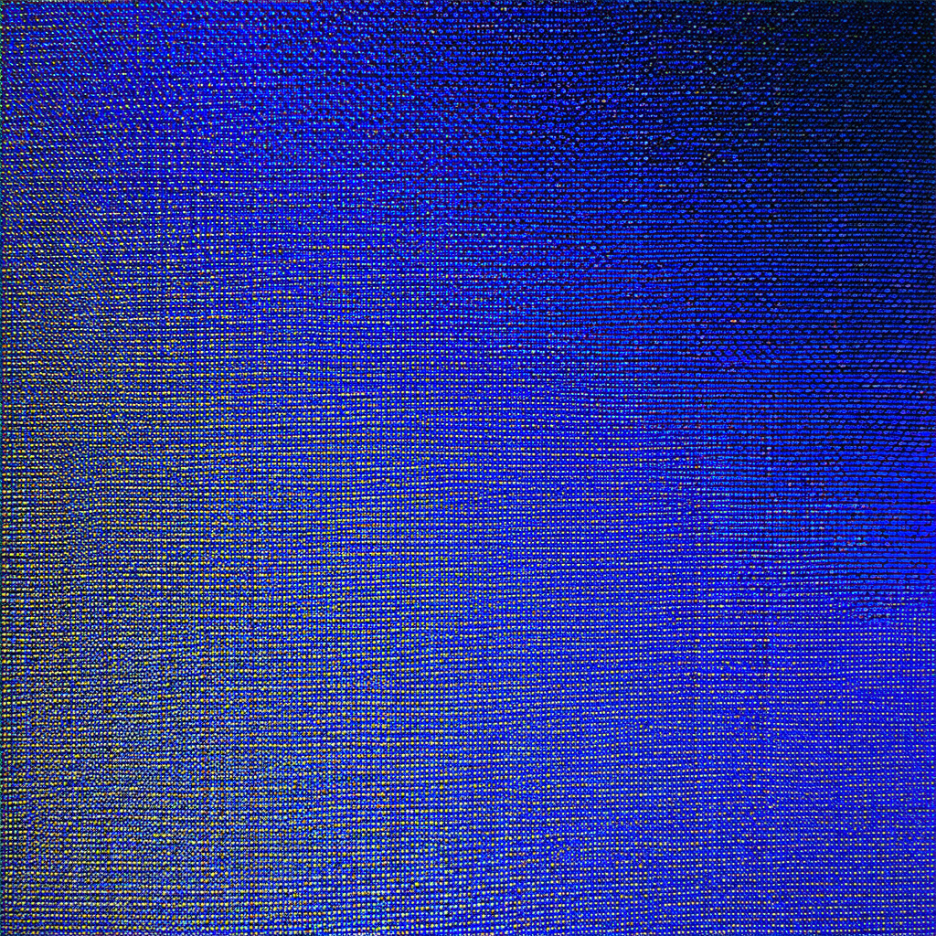 Close-up of a blue fabric, possibly a piece of clothing o...
