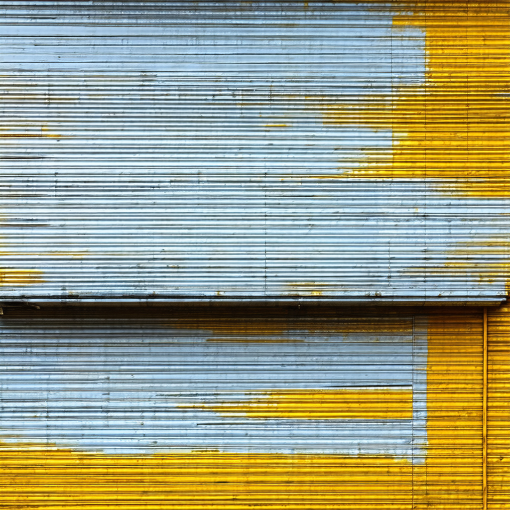 Yellow building with a blue door