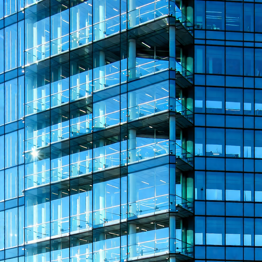 Urban Editorial Photography: Glass office tower with artistic facade