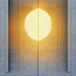 Large window with a sun shining through it, creating a be...