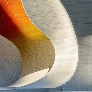 Large, curved wall with a colorful design