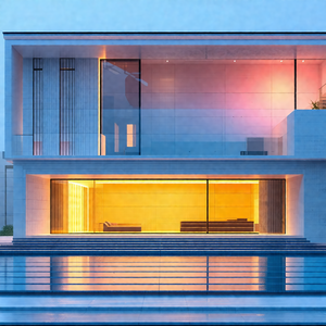 Large, modern-looking house with a glass facade