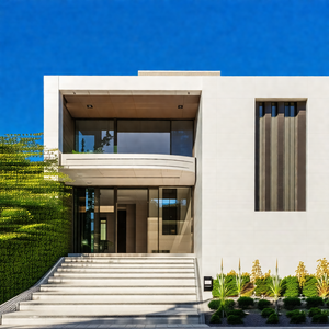 Large, modern-looking house with a white exterior