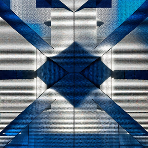 Large building with a blue and white color scheme
