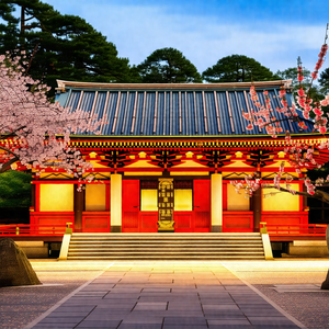 Beautiful red and white building with a large red roof