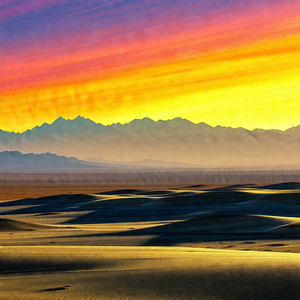 Beautiful desert landscape with a mountain range in the b...