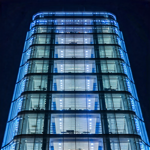 Urban Hdr Photography: Glass Office Tower With Dramatic Lighting With Tall Building